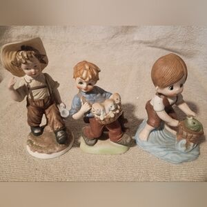 Whimsical Boy Figurine Trio - Brown, Blue, and Tan